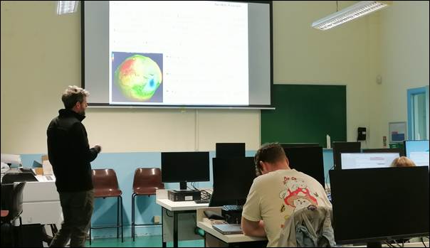 Figure&nbsp;2: Eoin Mac Craith discussing Geodesy with the class